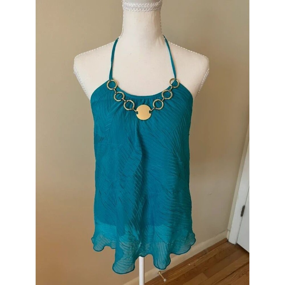 A. Byer blue halter with gold detailing